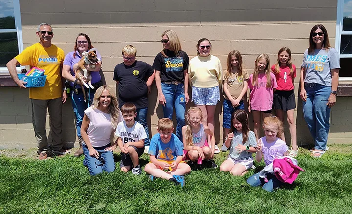 Top student readers turn pages into playtime for shelter animals